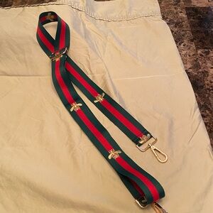 Stylish Green and Red Strap with Gold Bee Accents